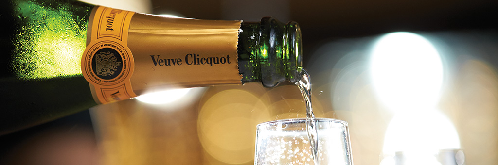 Pouring Veuve Clicquot Champagne Into Champagne Flute